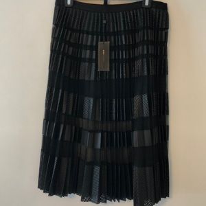 BCBG faux leather and sheer skirt